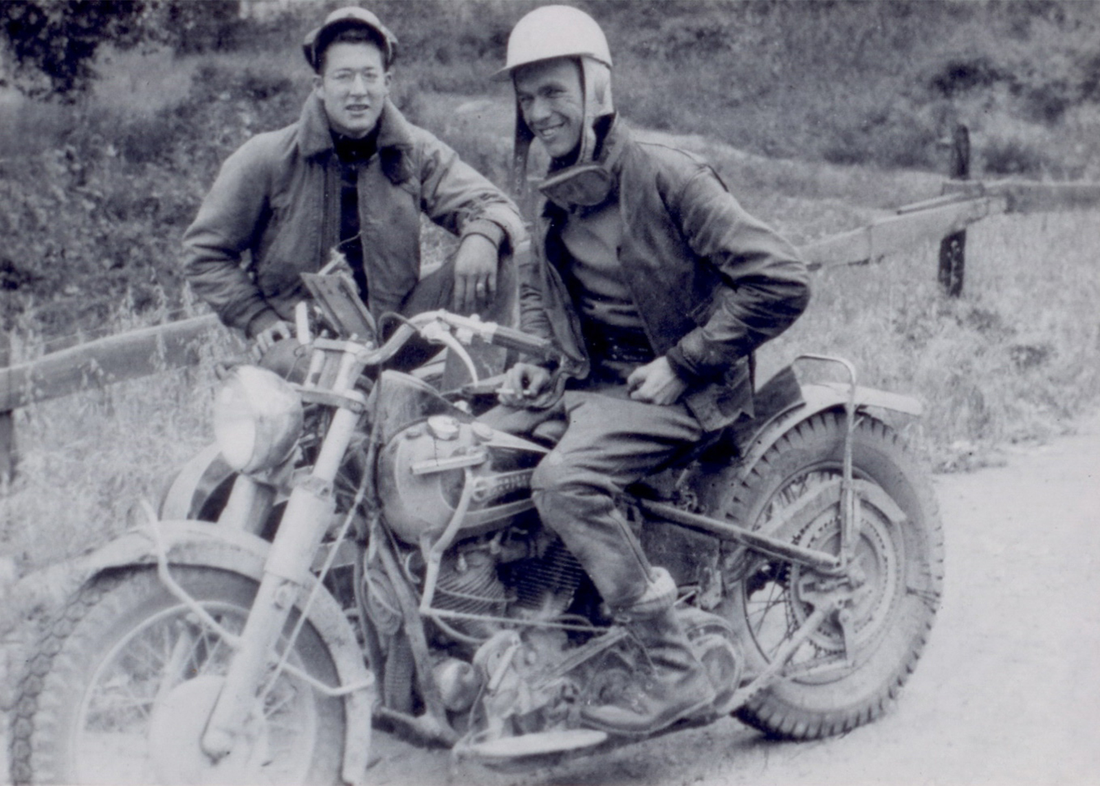 A vintage photograph of Bob Laidlaw on a motorcycle when young.