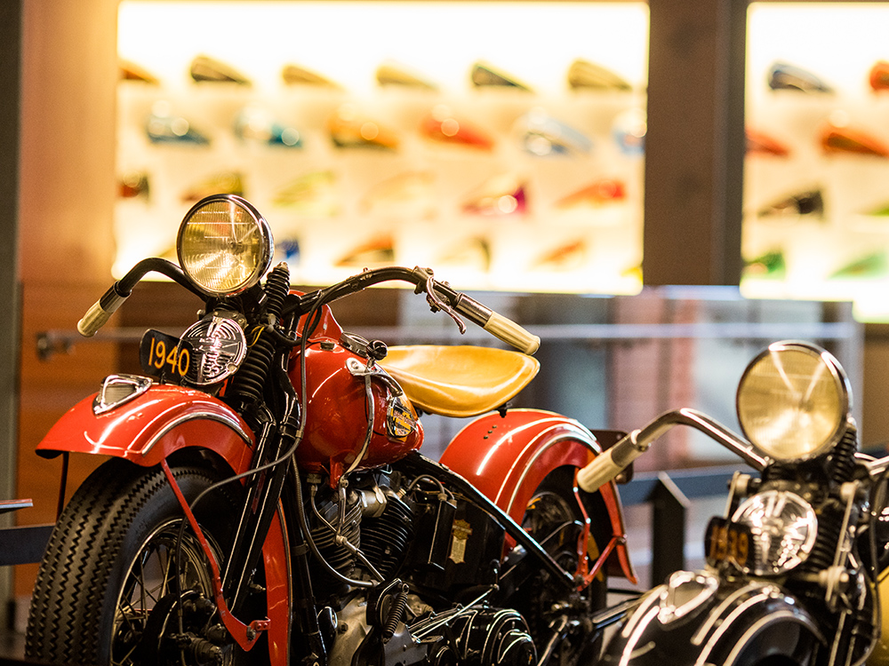 Vintage Harley-Davidson motorcycles displayed in museum gallery