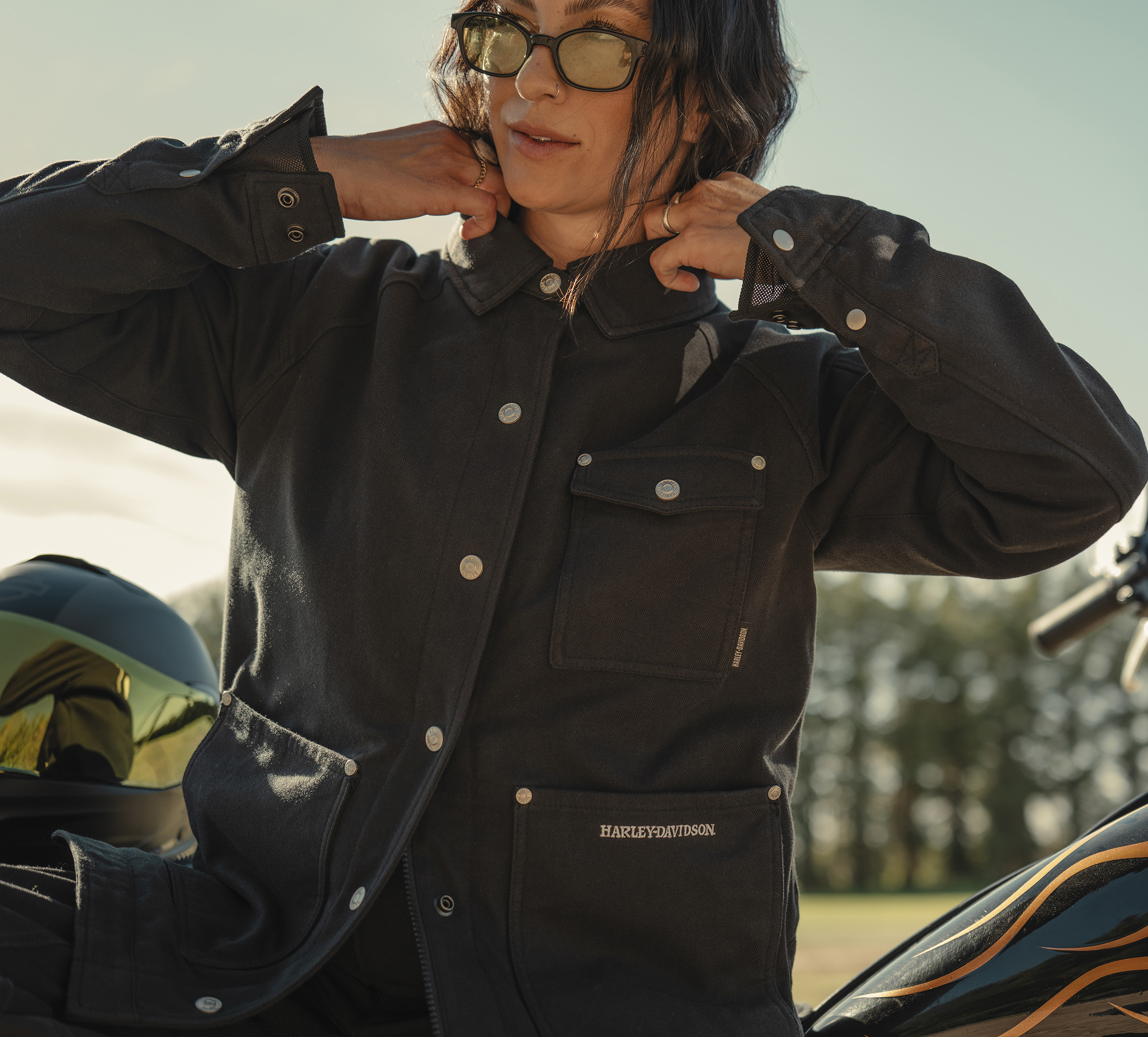 woman wearing motorcycle riding jacket