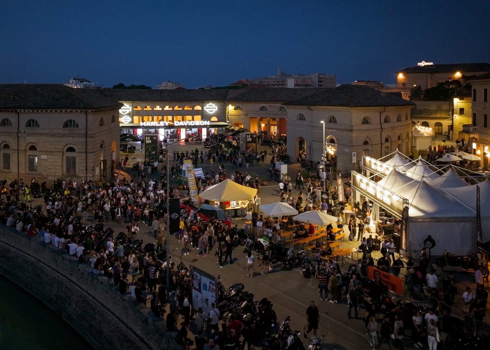 People walking through and exploring the Senigallia Spring Rally.