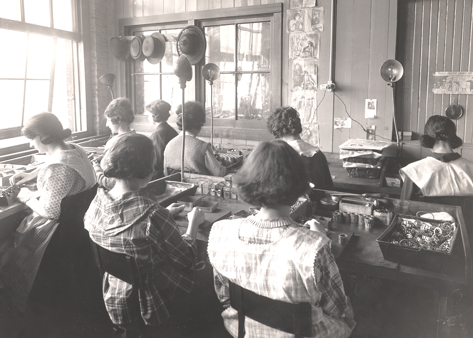 A group of women workers in a manufacturing facility