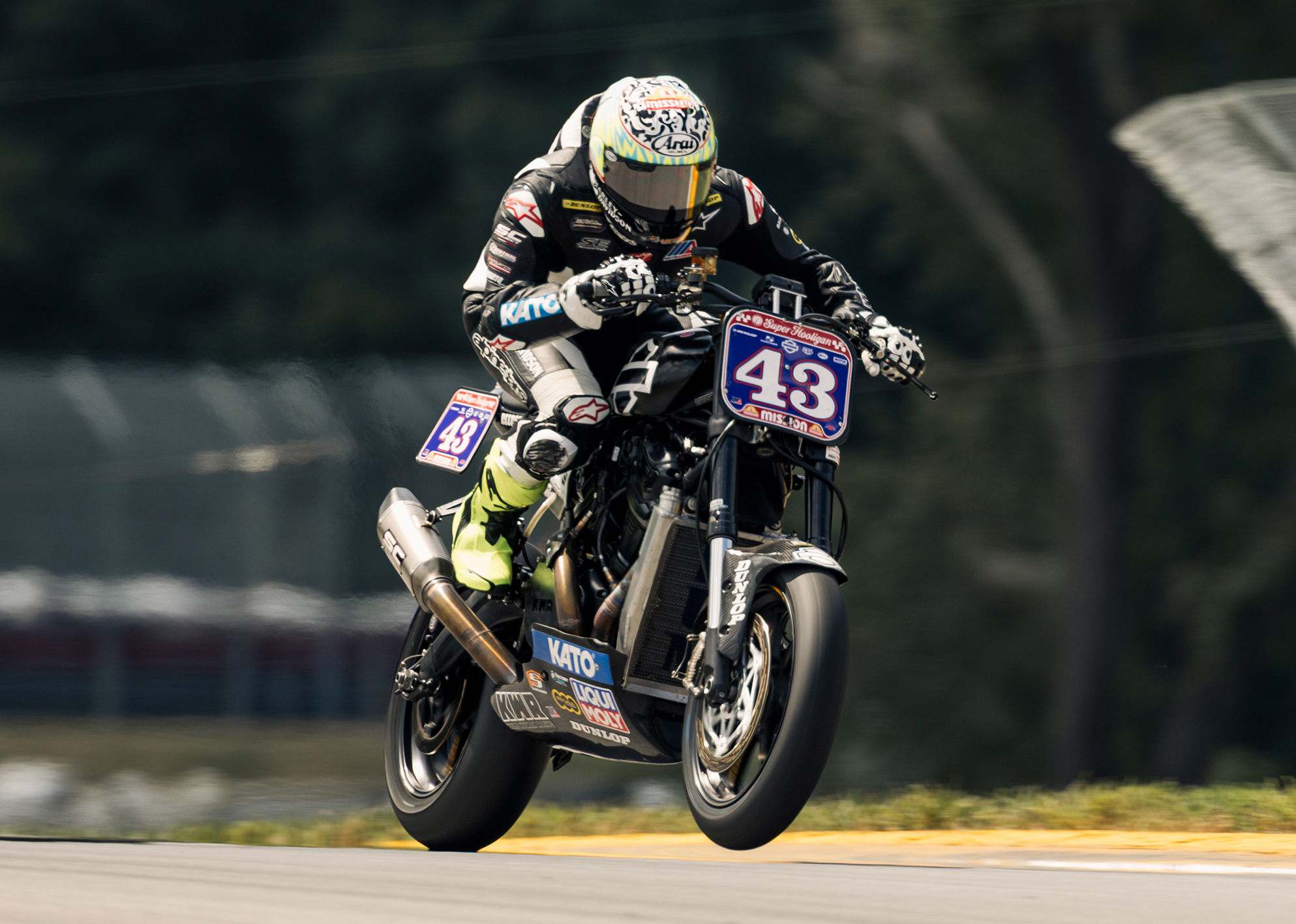 James Rispoli’s front wheel lifts off the track as he accelerates during a Super Hooligan race.