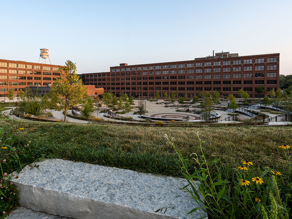 Harley-Davidson campus courtyard with landscaping and large brick buildings