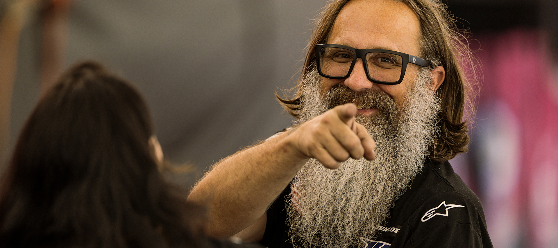 Harley-Davidson Factory Racing Chief Mechanic Jason Motal smiles and points at the camera.