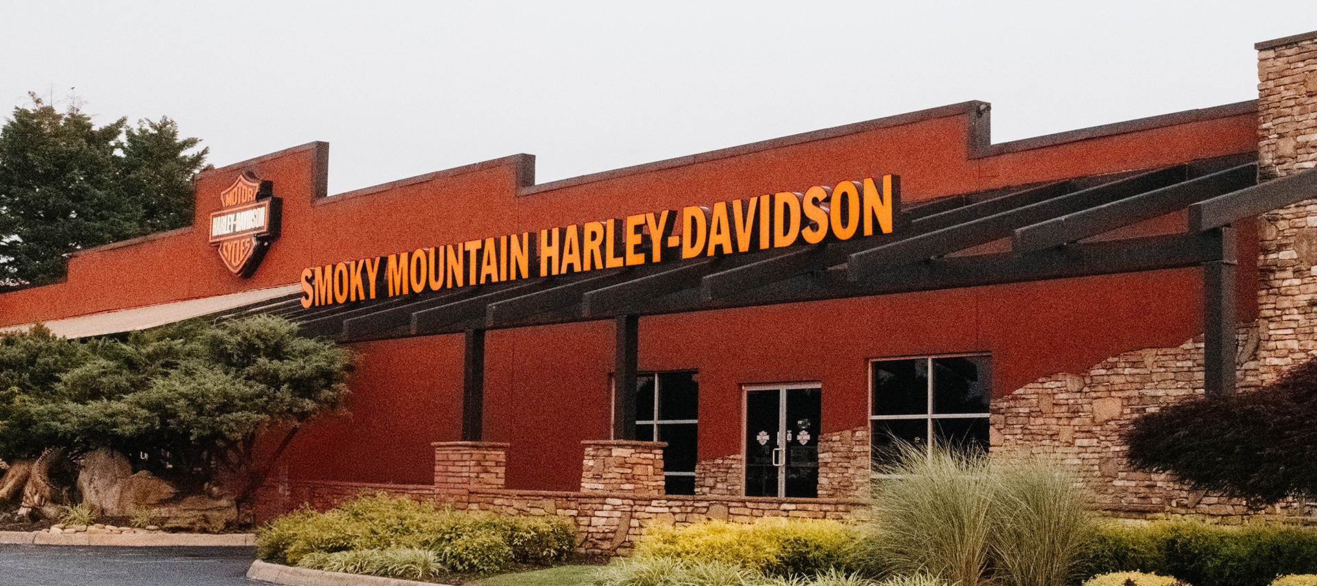 The exterior of Smokey Mountain Harley-Davidson dealership.