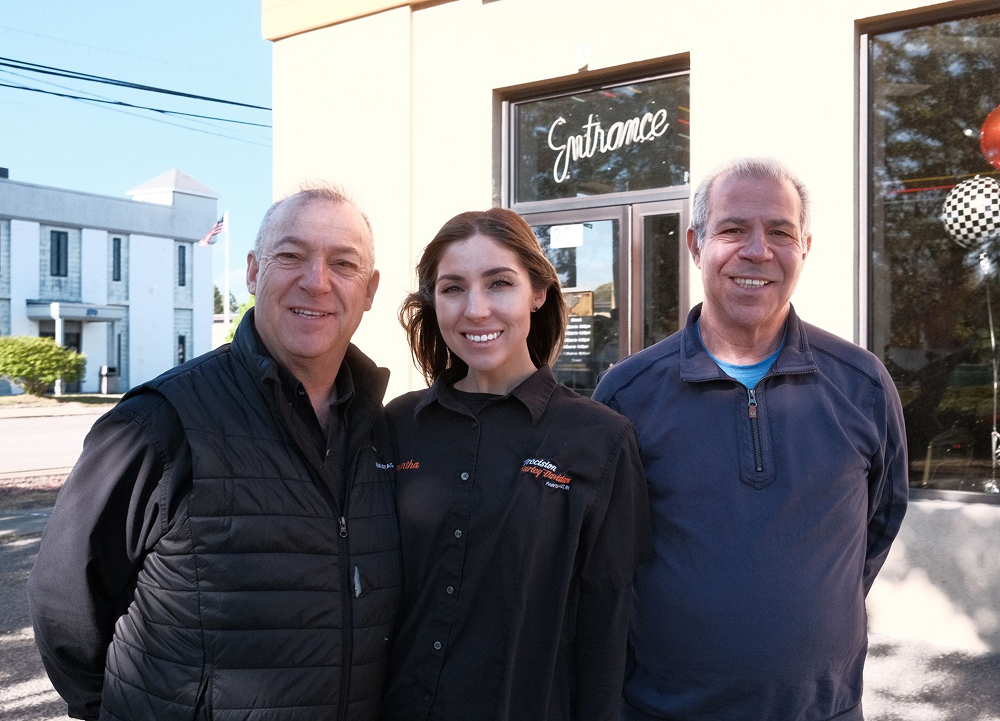 Richie, Samantha, and Jimmy Pilavin pose for a photo outside of Precision H-D