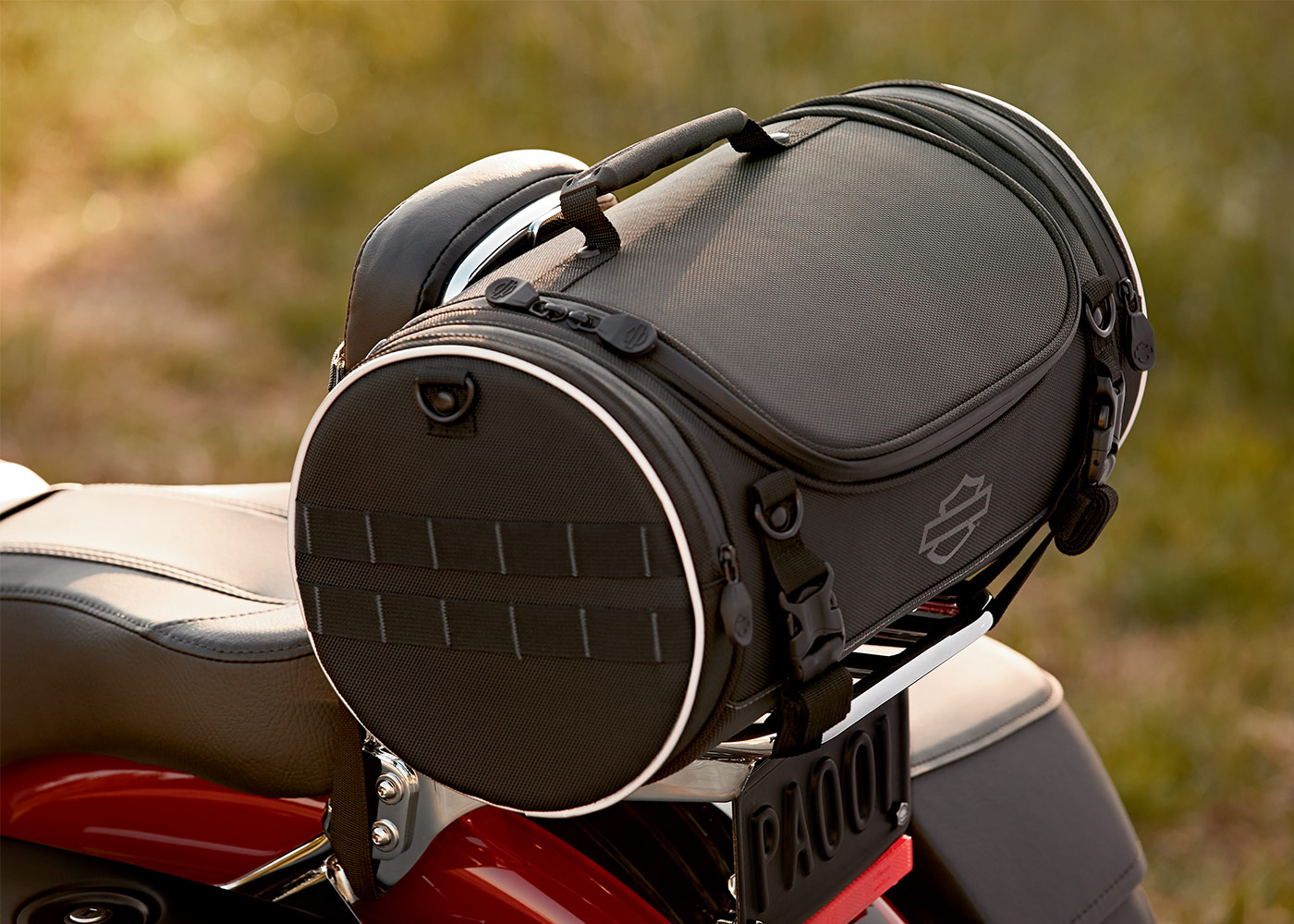 H-D travel bag attached to back of seat