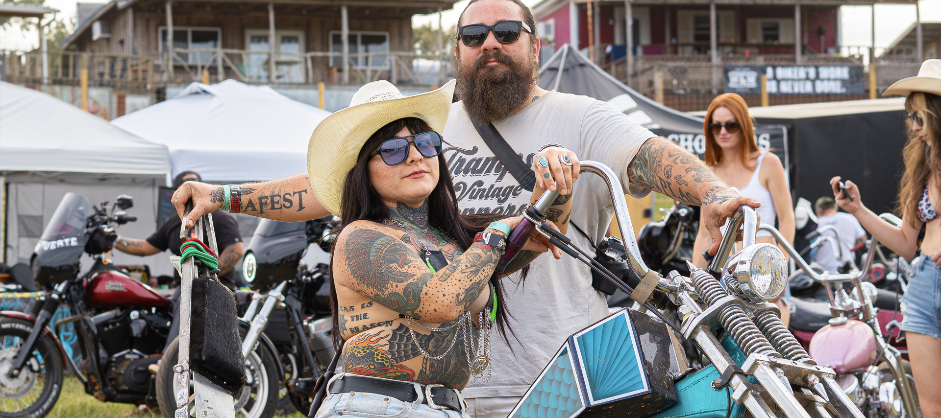 Man and woman with a Harley, landscape