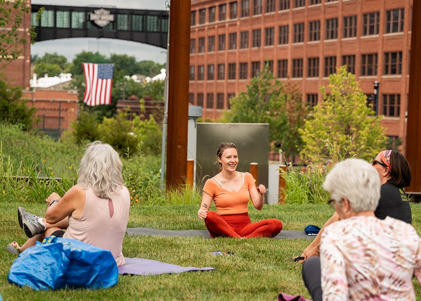 Outdoor yoga session at Harley-Davidson campus lawn