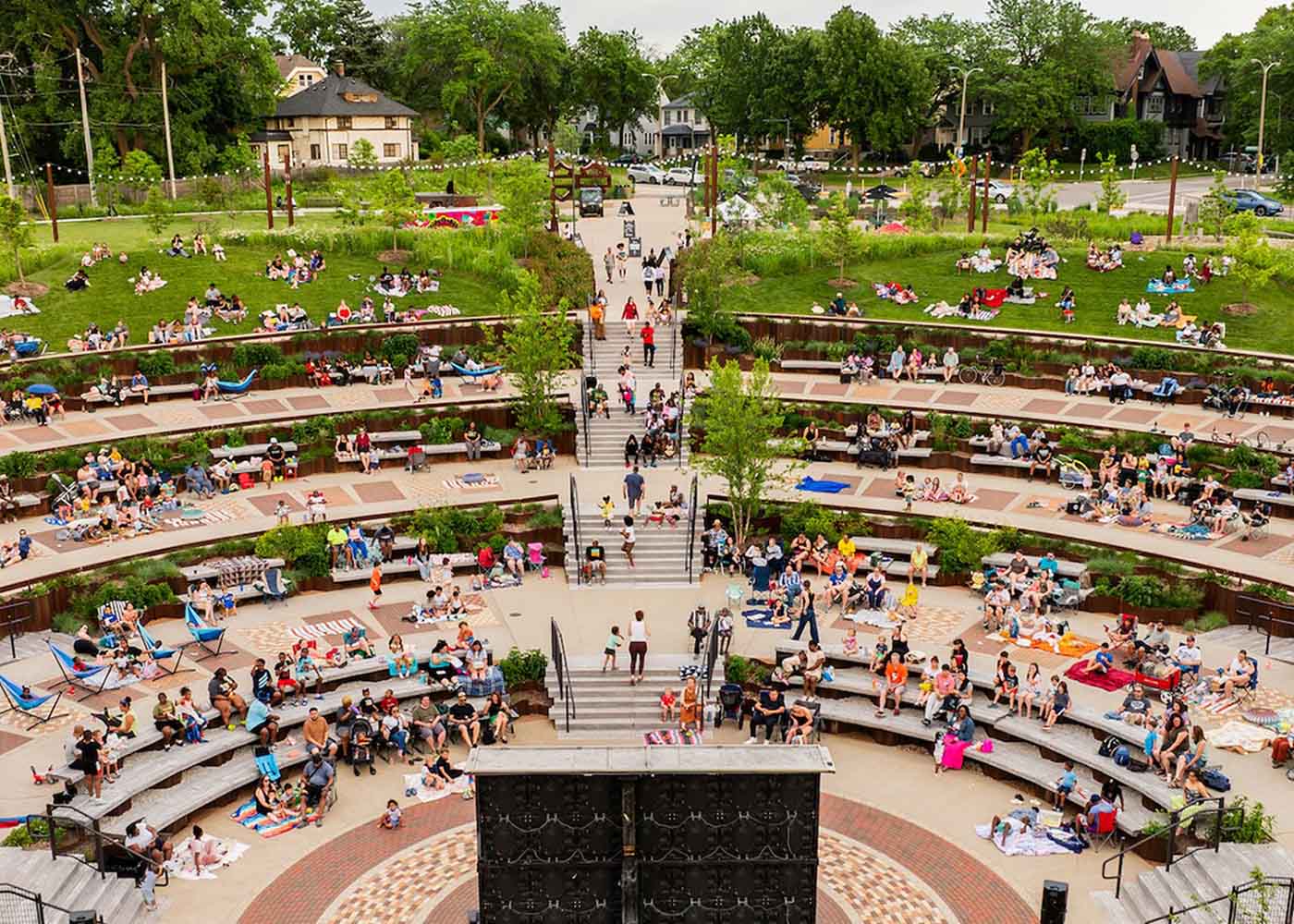 Aerial view of outdoor amphitheater with crowd gathered for community event
