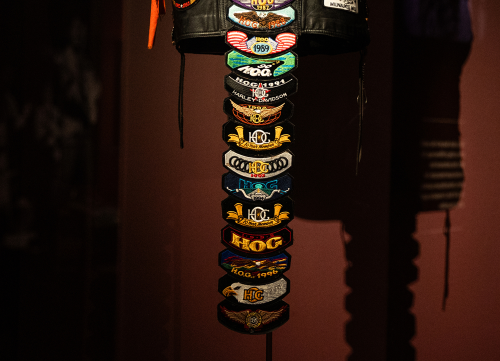 Another shot of the same vest, showing the bottom half of patches hanging off the vest like a tail