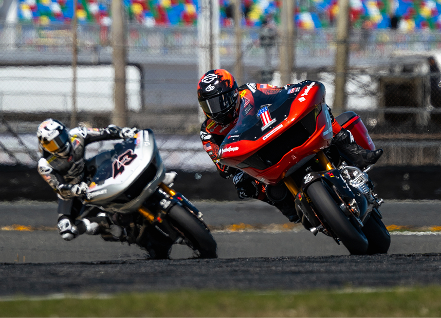 Kyle Wyman leads James Rispoli through a turn during a King of the Baggers race