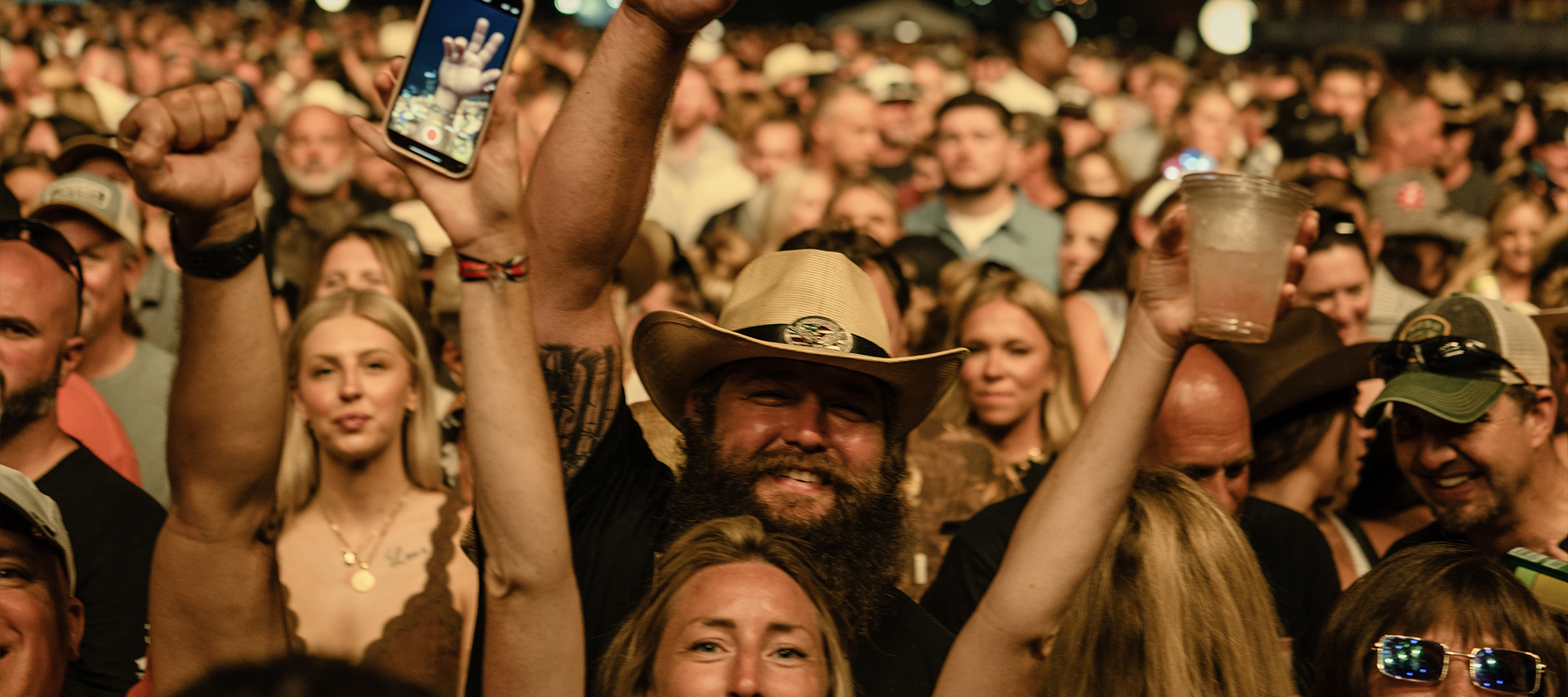  An close up of concertgoers having fun