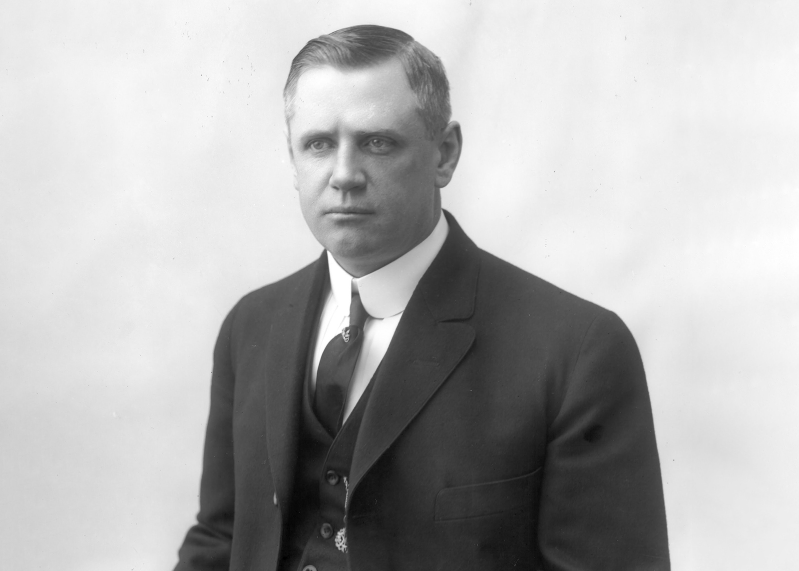 vintage black and white portrait of a man in a suit 