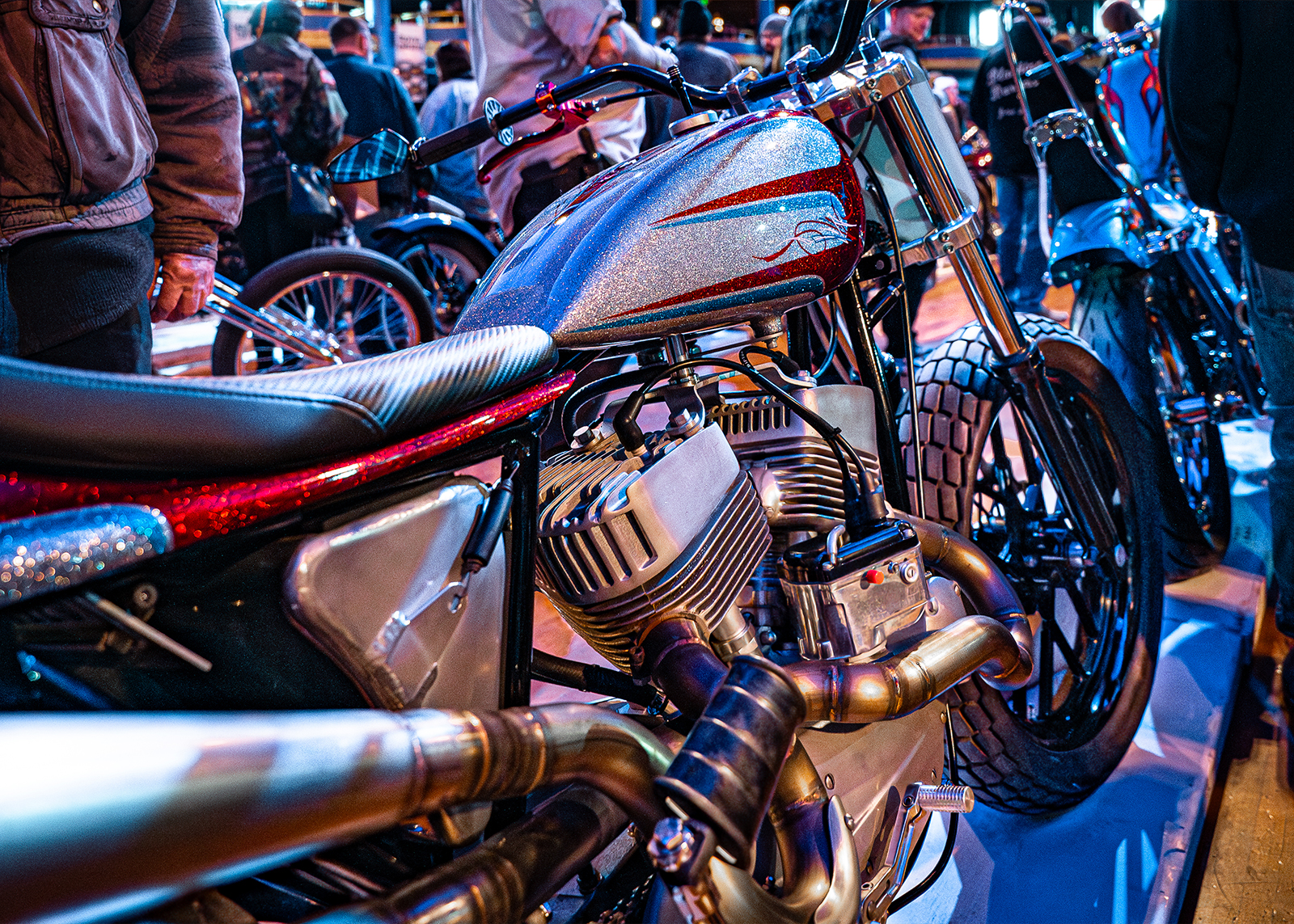 A customized vintage Harley-Davidson on a showroom floor