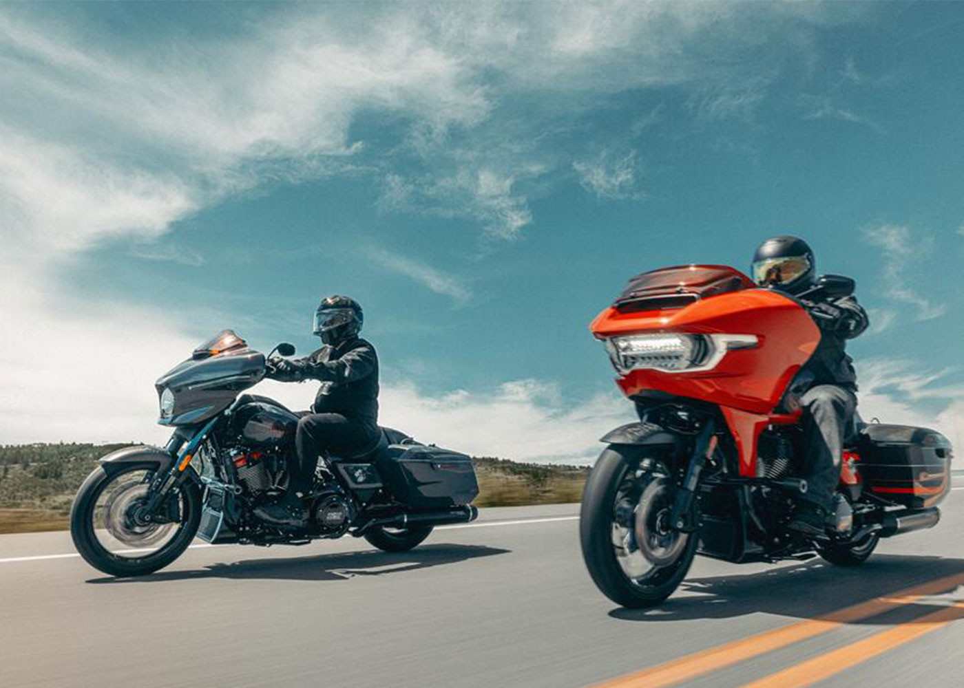 Street Glide and CVO Road Glide ST motorcycles riding on highway