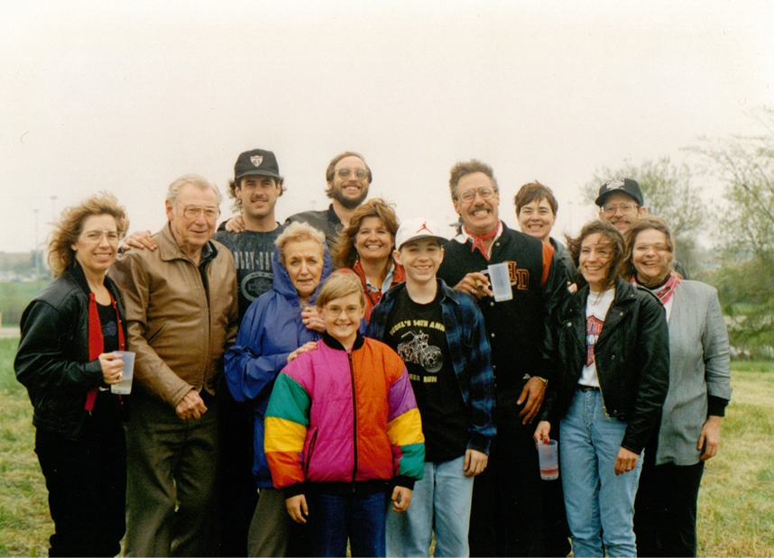 A vintage color photo of the Kegel family standing outdoors on grass