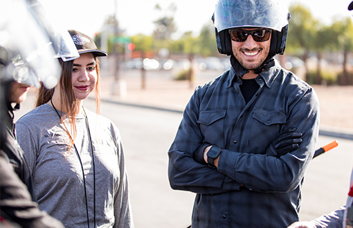 Man in helmet and woman 