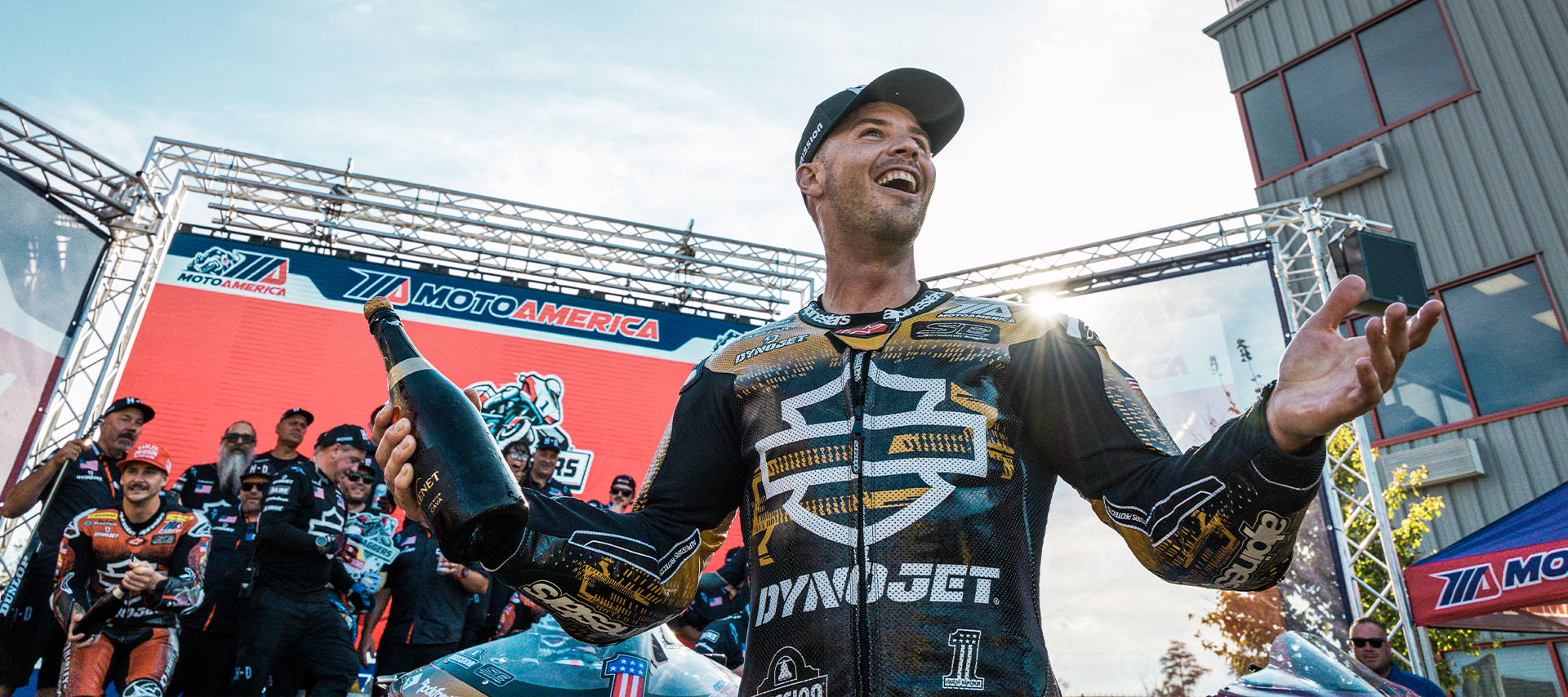 Kyle Wyman celebrates with the Harley-Davidson Factory Racing Team after winning the King of the Baggers championship.