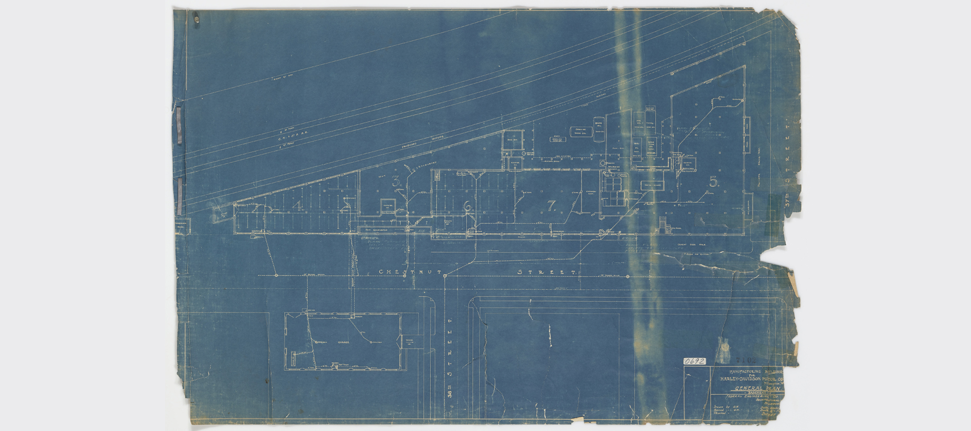 Blueprints of a large manufacturing campus
