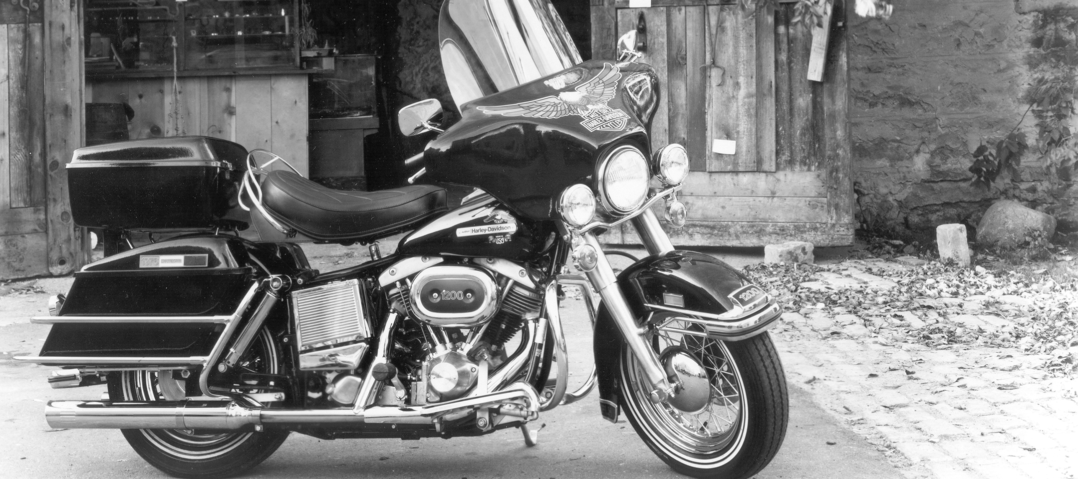 Black and white photo of a 1976 Liberty Edition Harley-Davidson touring motorcycle