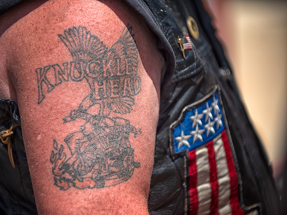Knucklehead motorcycle tattoo on arm