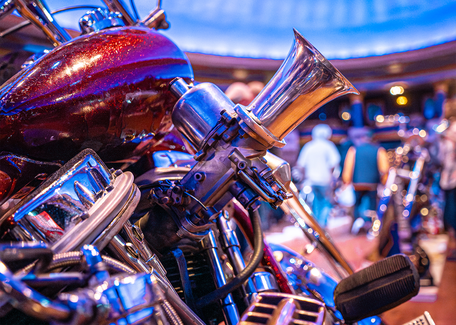 Details of a carburetor and panheads on a vintage motorcycle