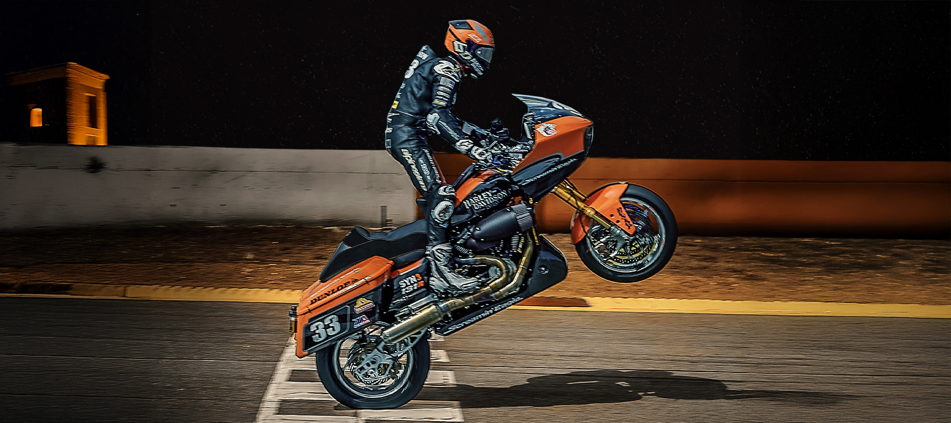Kyle Wyman wheelieing his bagger on a race track