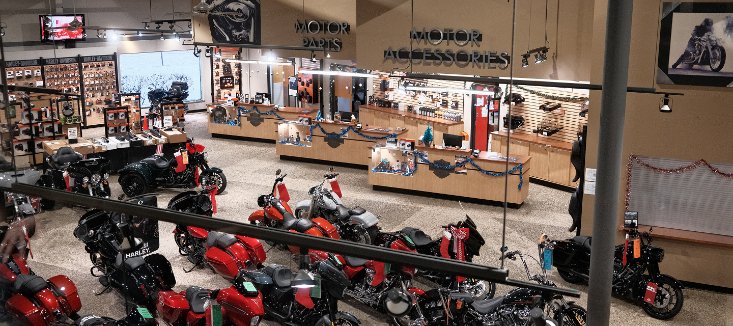 Looking down at motorcycles, parts, and accessories on the showroom floor of Harley-Davidson of Madison