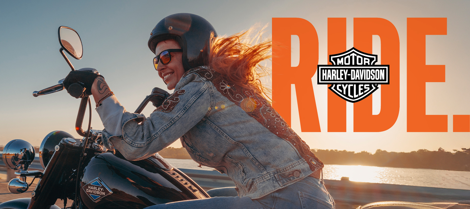 rider sunglasses long hair smiling ride graphic shot