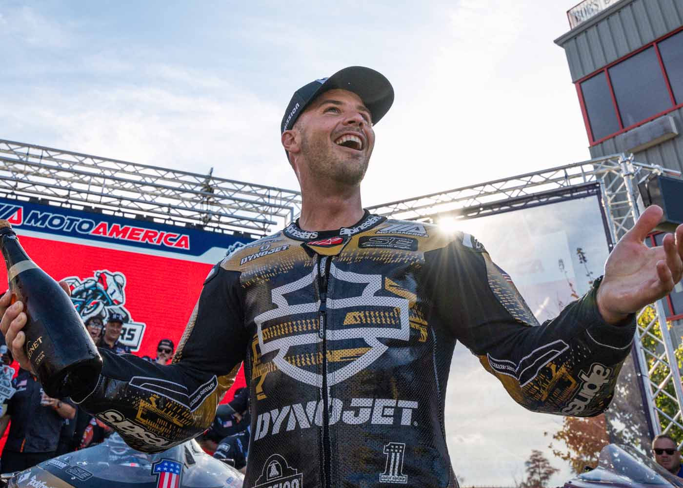 Kyle Wyman with bottle of champagne