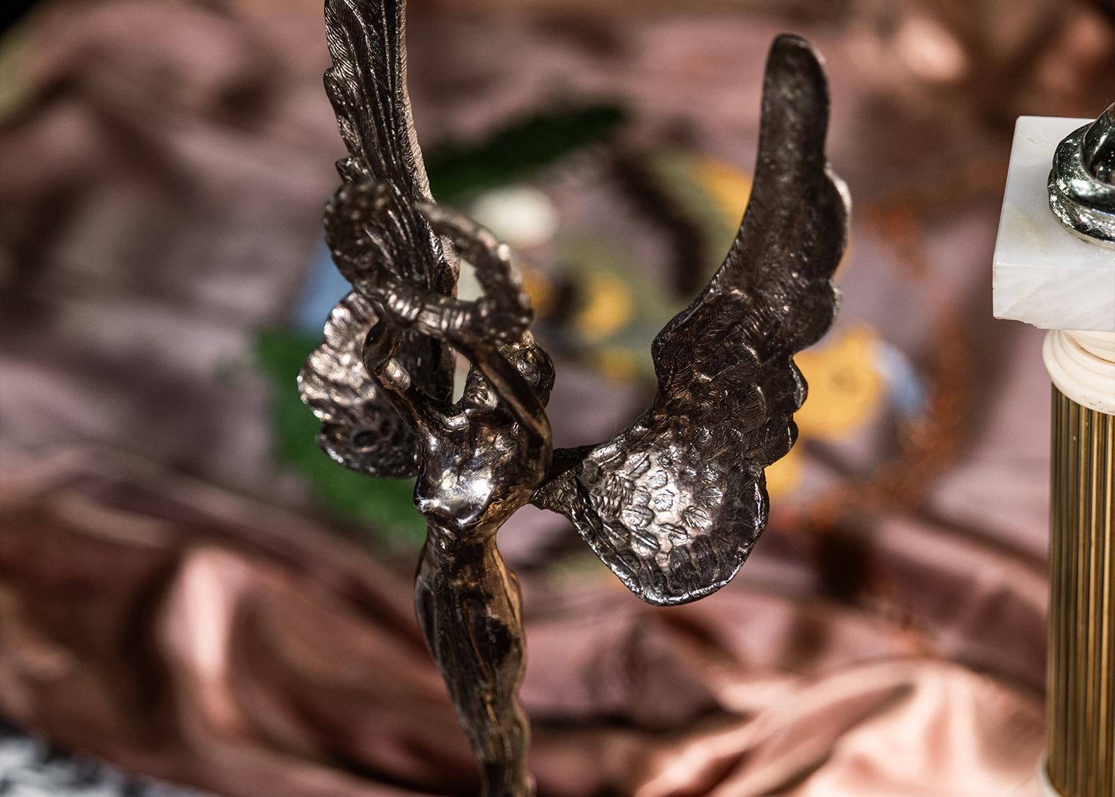 A close up of a vintage trophy awarded to Alfonso Sotomayor.