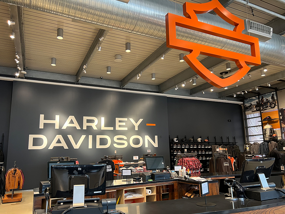 Harley-Davidson retail store interior with merchandise and service counters
