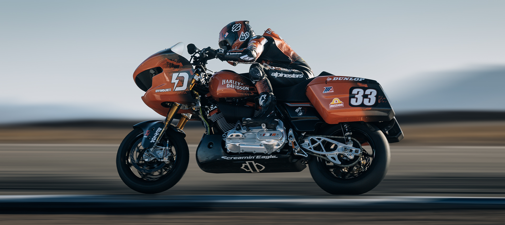 Kyle Wyman rides his race-prepared Road Glide at speed on a racetrack
