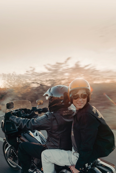 two riders on moto riding shot